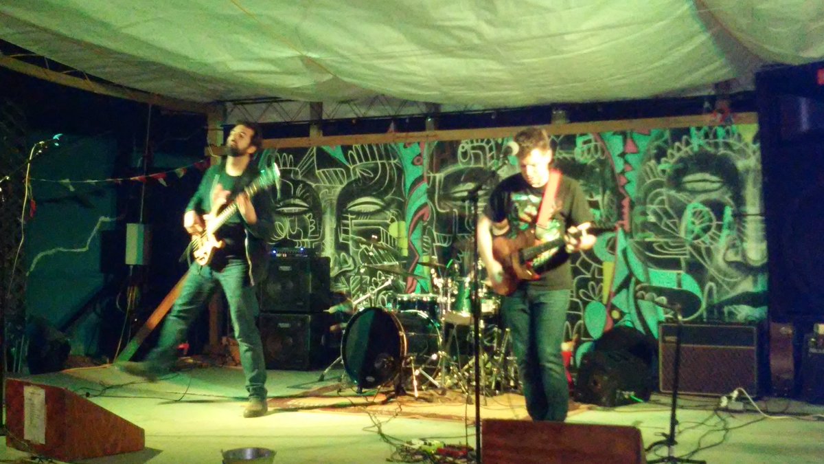 The lights are on for Opposite Day at #VFshowcase. Blazing runs and quirky lyrics abound. Bassist Greg Yancey is a luthier...he made his bass and Sam Arnold's guitar in this photo.