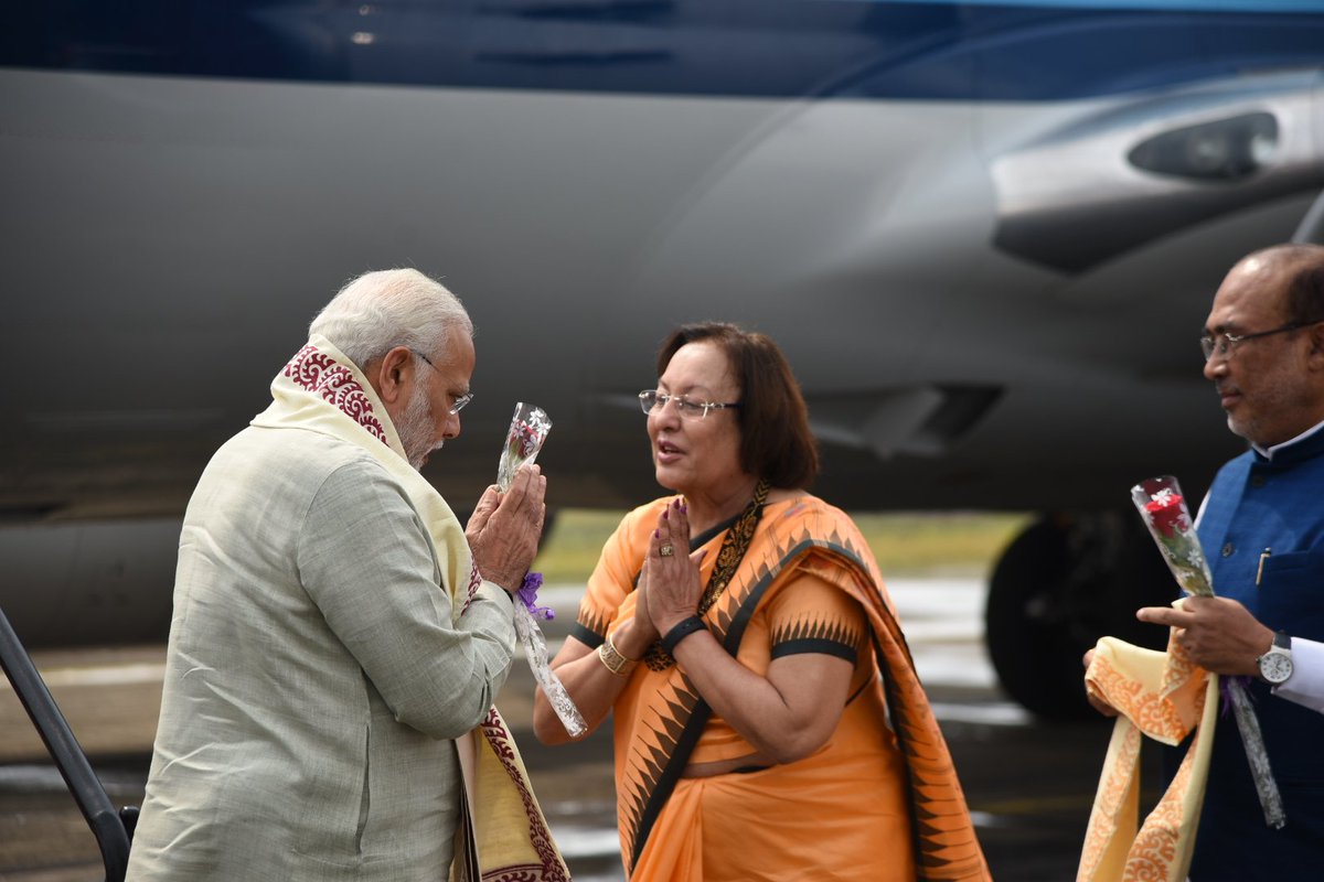 PMOIndia's tweet photo. Manipur Governor @nheptulla, Chief Minister @NBirenSingh and others welcomed PM @narendramodi to the state. https://t.co/bzHvYGiQPX