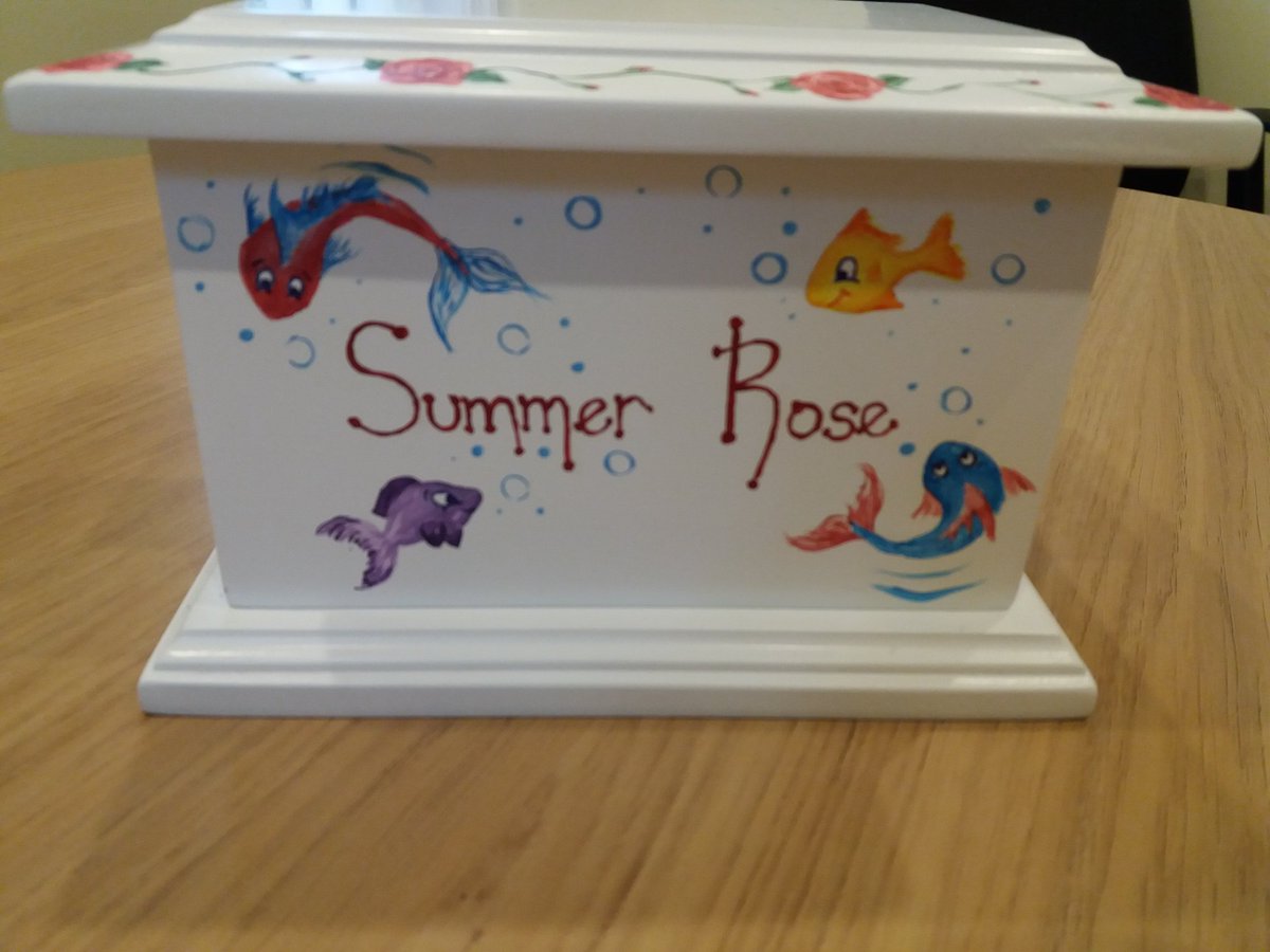 A bespoke ashes box, which we were asked to paint to the same design we created for the coffin. Reducing a design in size and scale is a bit of a technical challenge. Picture used with kind permission of the Thompson family 
#ashesbox #bespokeurn #paintedcoffin #memorybox