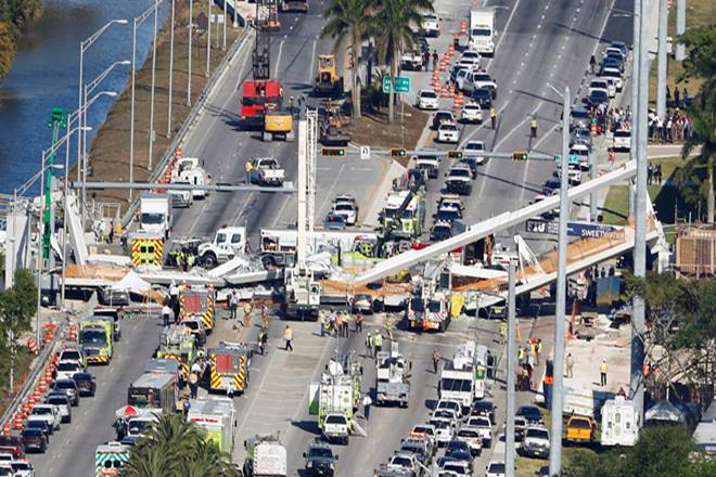 MICHAELDOLLAR's tweet photo. 6 DEAD 8 Cars CRUSHED #ThingsWeTakeForGranted 'NEW' PEDESTRIAN BRIDGE Collapsed FIU Campus BECAUSE Republicans only Care about TAX SCAM CUTS & NOT our 'OLD' DILAPIDATED INFRASTRUCTURE More Collapses to Come #SignsYoureInHell #FlashbackFridayFeeling #NeverAgain #VoteOutGOP #ENOUGH https://t.co/P8XoRNaZds