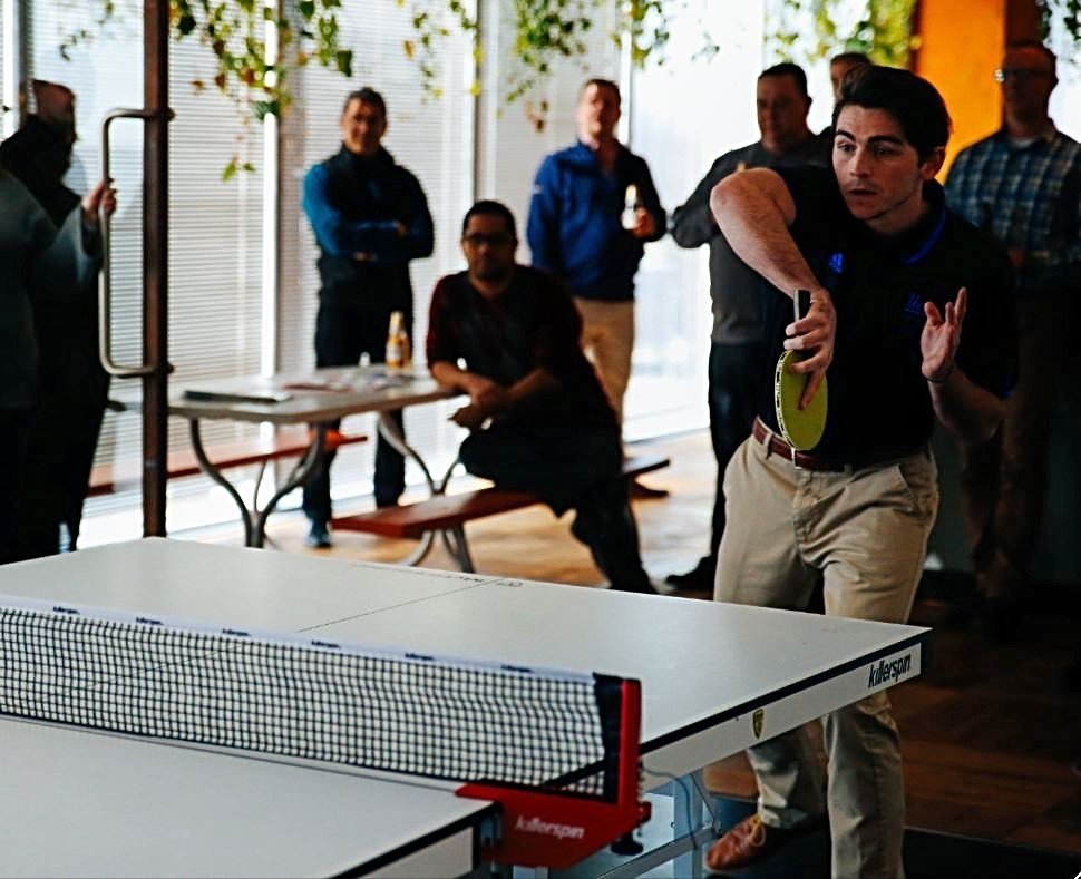 Forecast5's tweet photo. The F5 Winter Classic Ping Pong Tournament was a success! Intern Tyler held his own against some fierce competition. 🏓🏆😎 #officefun #workculture #F5Team https://t.co/TUluhDSVCP