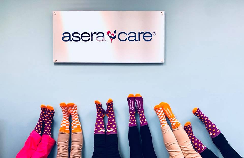 AseraCare's tweet photo. Our AseraCare Nashville crew is showing their support for @alzTN and #SockOutAlz! Sock Out Alzheimer’s in 2018! #AseraCareHospice #Nashville https://t.co/5wT4XNjoFP