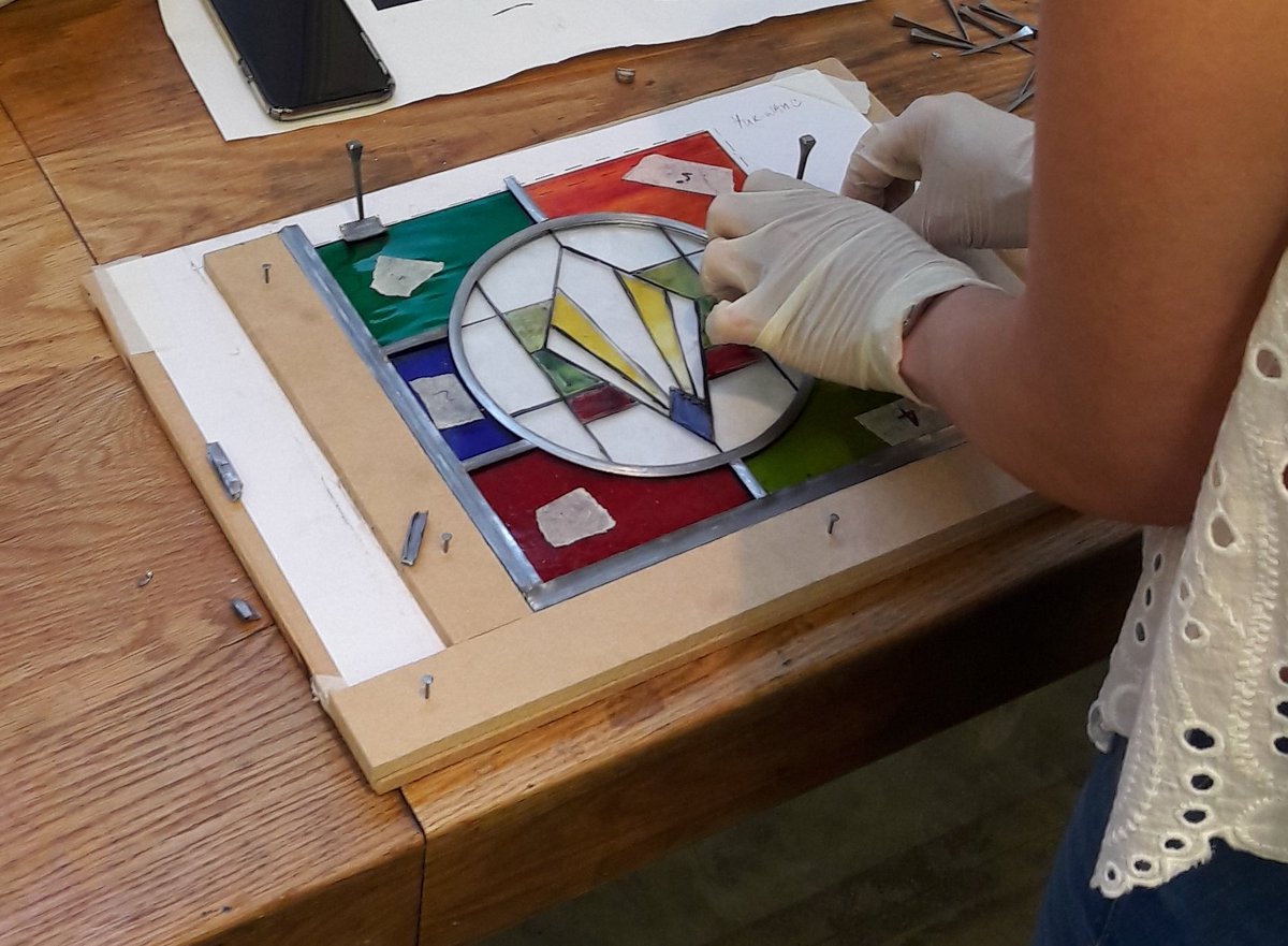 Stacy_Gambrell's tweet photo. Glass has been cut, painted and fired - time to start adding the lead in our #oceanliners inspired #stainedglass course https://t.co/zBNH6rfy9j