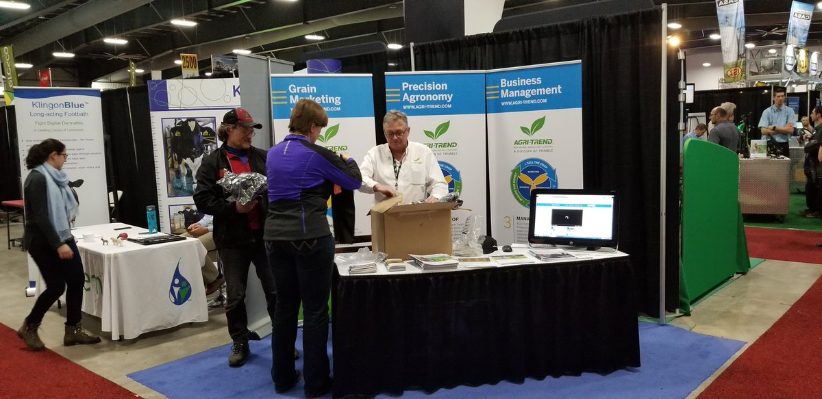 AgriTrend's tweet photo. Agri-Coach, Bob Dalton, with a customer at the @OttawaFarmShow this week. We had a great time meeting growers and discussing ways we can help them #GrowProfits this season. #OVFS18 https://t.co/kdCDuU7CiI