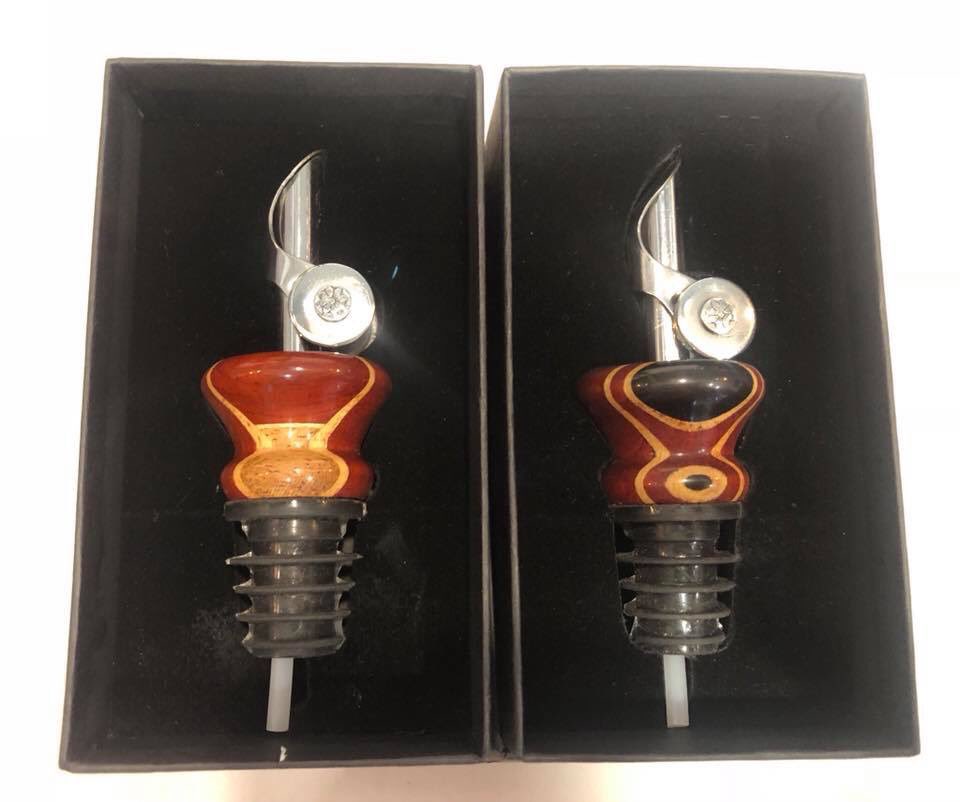 Our beautiful new pour spouts are made from sustainably harvested exotic woods, which are hand carved and polished. The spigot is made from food grade stainless steel. The stopper is made with safe, non-leaching, heat resistant silicone, it offers a nice snug fit in the bottle.