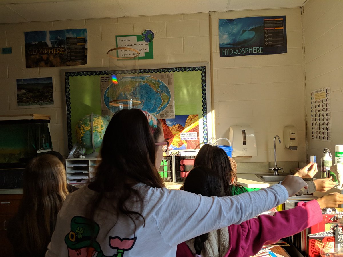 Students are finding a pot of gold in science today with prisms and more. #CPSPride