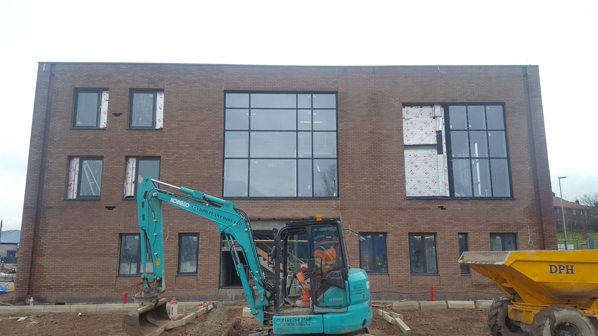 TriangleArch's tweet image. Very busy on site at the @rbhousing @builtbybardsley Strand development in #Kirkholt! Scaffolding down, curtain wall glazing installed &amp;amp; zinc cladding started. Coloured panels to be installed soon, with change of use applications being submitted as future tenants are confirmed.