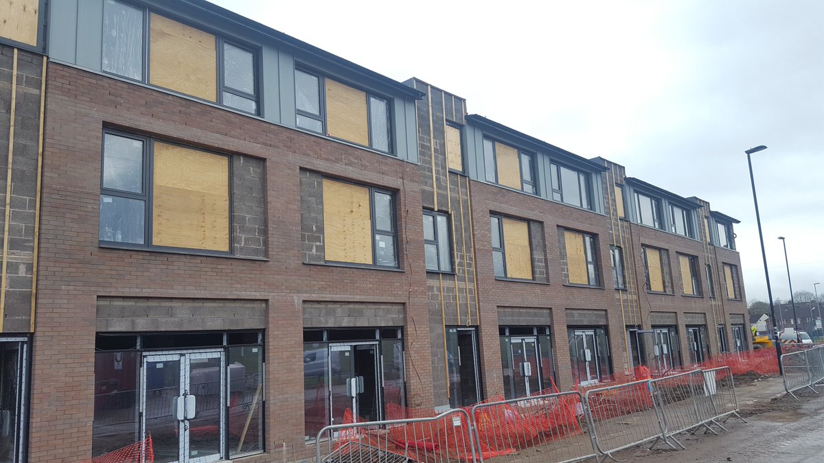 TriangleArch's tweet image. Very busy on site at the @rbhousing @builtbybardsley Strand development in #Kirkholt! Scaffolding down, curtain wall glazing installed &amp;amp; zinc cladding started. Coloured panels to be installed soon, with change of use applications being submitted as future tenants are confirmed.