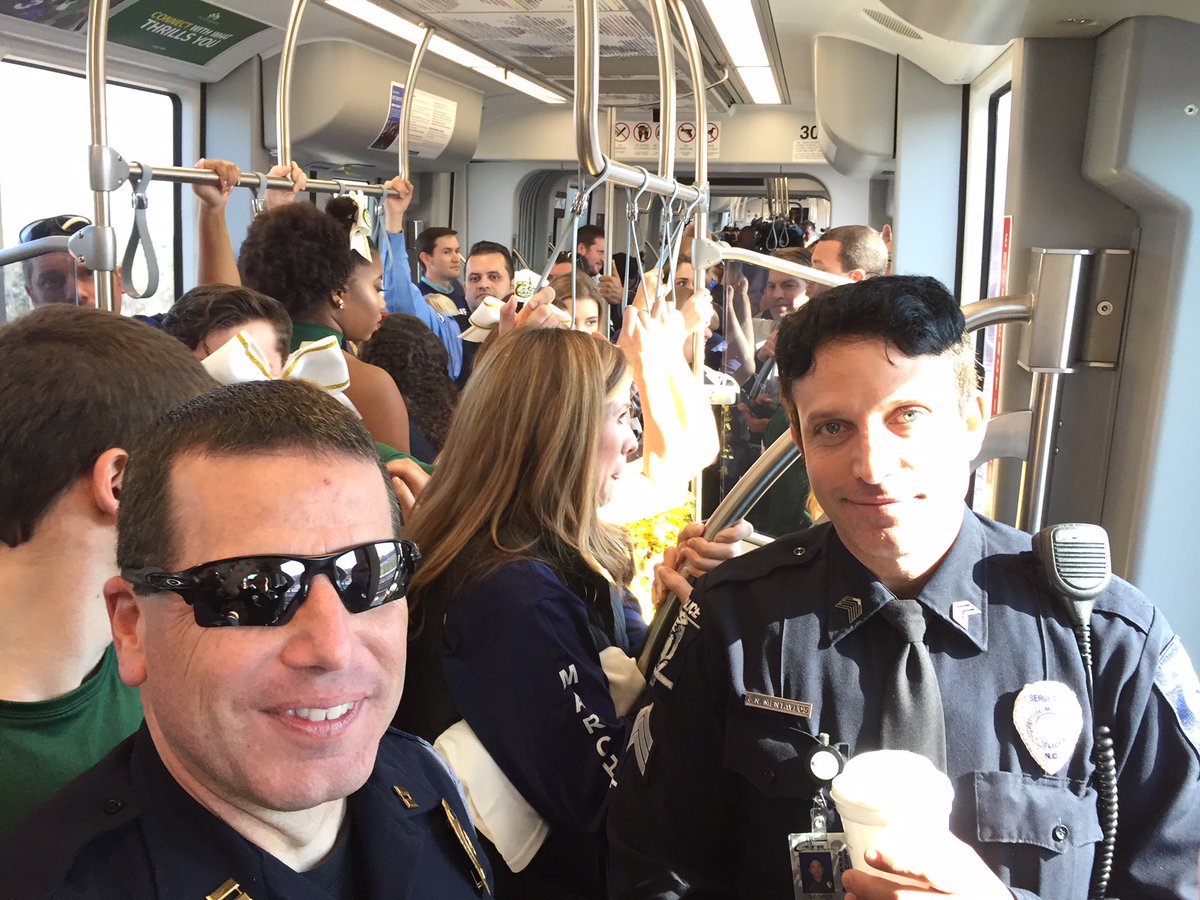 CMPD's tweet photo. Our officers were among the first to ride the Blue Line today @UCityPartners #TransitConnectsUs #MovingCLTForward #LYNXBlueLine https://t.co/fhjOaXxTJS