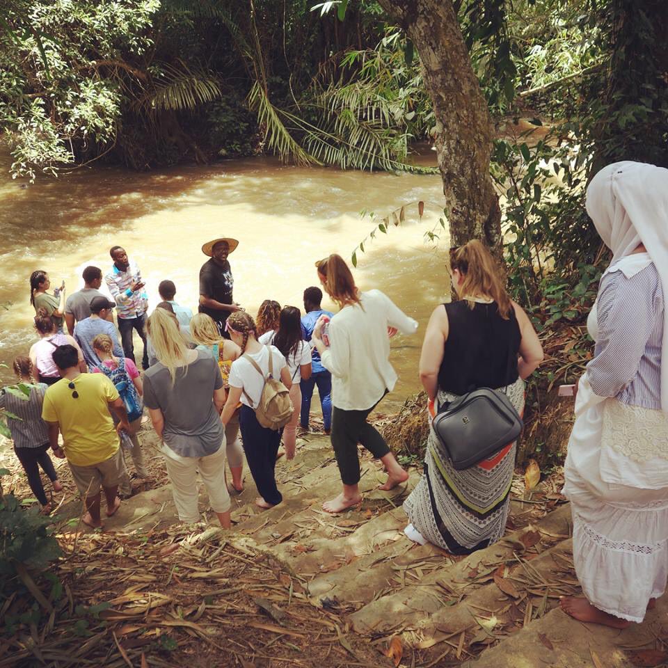 brianhollar's tweet photo. Yesterday, we visited Slave River near Cape Coast, where captives would take their last bath before getting sold into slavery. At the end, they had a recognition pillar only people of African descent were allowed to sign, including four of our group members. @marymountu #Ghana https://t.co/POIDfaQezn