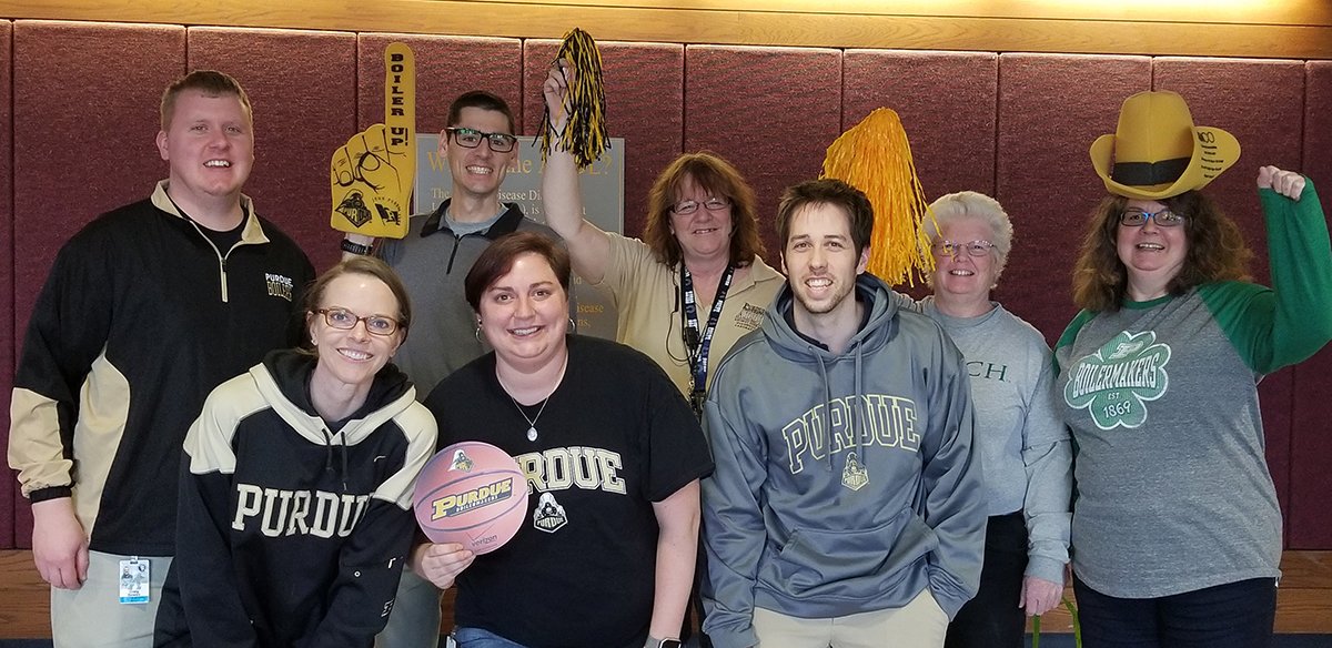 pucvm's tweet photo. (L-R, back) Dr. Craig Bowen, Dr. Ryan Schafbuch, Margie Veverka, Tammy Crowell, Mary Ruzicka and (L-R, front) Dr. Andrea Vanderpool, Kayla Guenther, Zach Wise representing #PVMPride for the ADDL! #PurdueVetMed #MarchMadness2018 @LifeAtPurdue https://t.co/ytw403REVH