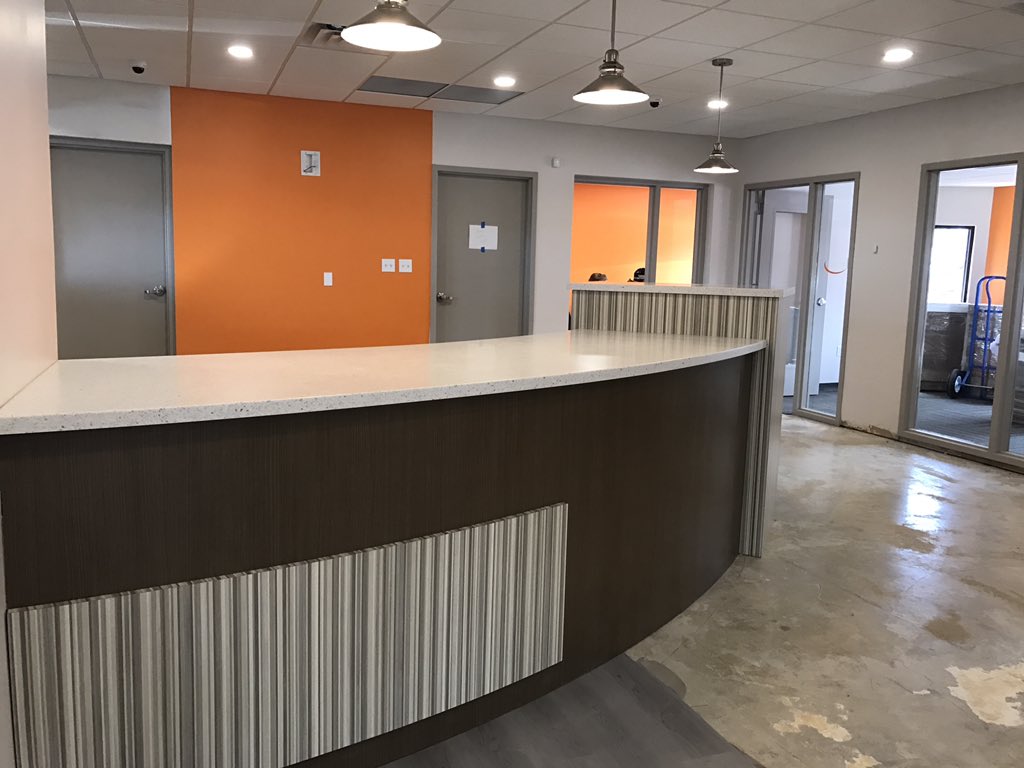 Our Wheeling location is thriving this week! New teller table, lighting, floors and more progress all over.