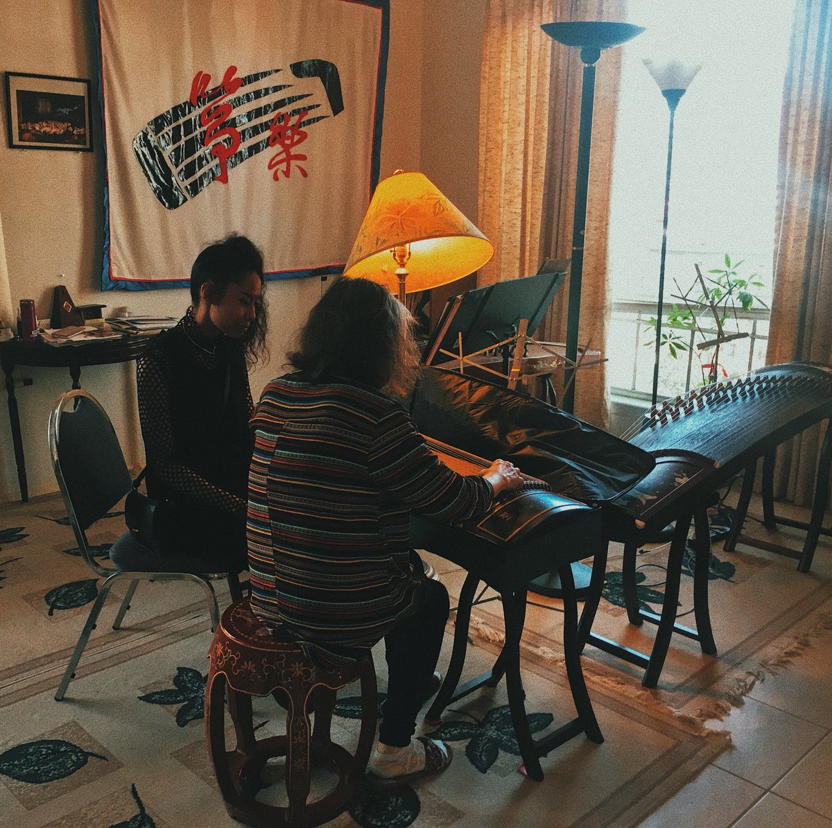 kaylabriet's tweet photo. many warm feelings from today’s visit to Ms. Shao here in austin 🌼 she played for us in her home... an honor that this will be the guzheng I will be caring for and playing this weekend here for my first showcase at sxsw. *heart is happy*🌟 https://t.co/DOsNz4FInR