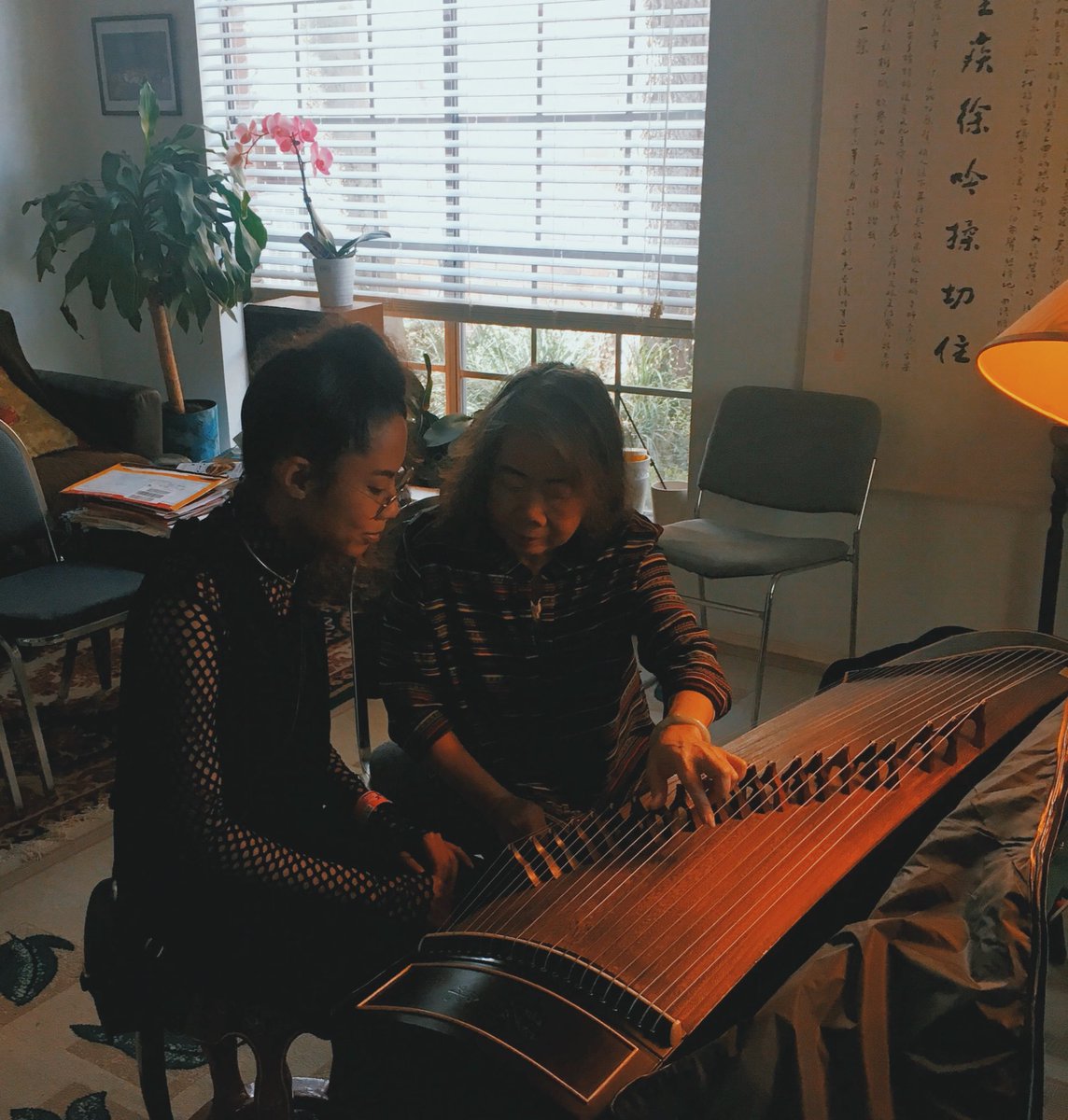 kaylabriet's tweet photo. many warm feelings from today’s visit to Ms. Shao here in austin 🌼 she played for us in her home... an honor that this will be the guzheng I will be caring for and playing this weekend here for my first showcase at sxsw. *heart is happy*🌟 https://t.co/DOsNz4FInR
