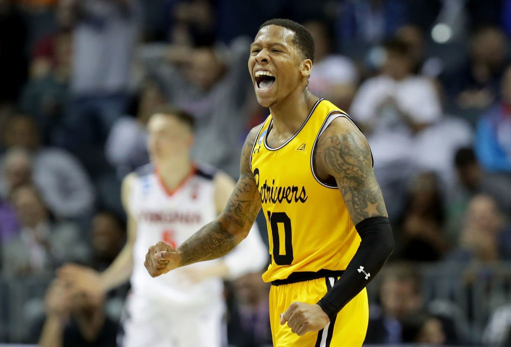 ESPNInsights's tweet photo. 16 seeds were 0-135 all-time against 1 seeds...until tonight!

UMBC becomes the first 16 seed to ever beat a 1 seed.

It's the Retrievers' first-ever NCAA Tournament win. https://t.co/3af1eyCqTc