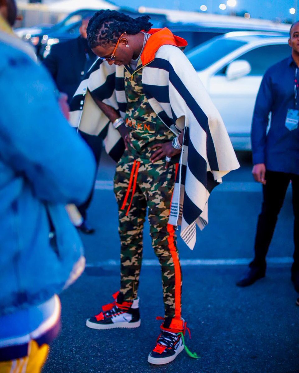 UpscaleHype's tweet photo. .@youngthug wears a #SaintLaurent @YSL poncho, @mstknsociety camo hoodie & pants, and @OffWht sneakers. #youngthug #ysl #mstkn #offwhite https://t.co/6nQoFHs8F5