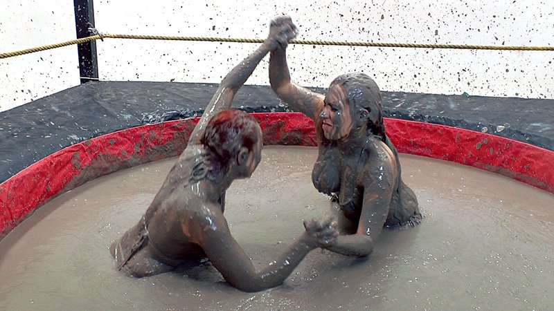in a new mud wrestling video! 