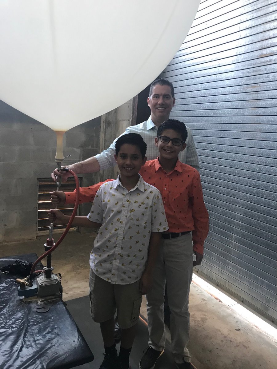 NWSTampaBay's tweet photo. Look who's interested in science! Tristan and Ashton from Incarnation Catholic School learned more about the National Weather Service and the data collected by the weather balloon this evening. Thanks to middle school earth science teacher and meteorologist Josh P. #flwx https://t.co/5TirAl2QNL