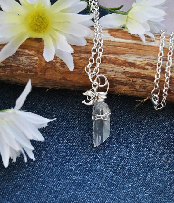 buff.ly/2GC0Yxg Raw quartz necklace with dolphin charm by Rocks2Gems2Wire #KISTeam #EtsyTeamUNITY #SpecialT #dolphin #rawquartz #crystaljewelry #clearcrystal #handmadejewelry #shopsmall #marinelife #beachtheme #oceantheme