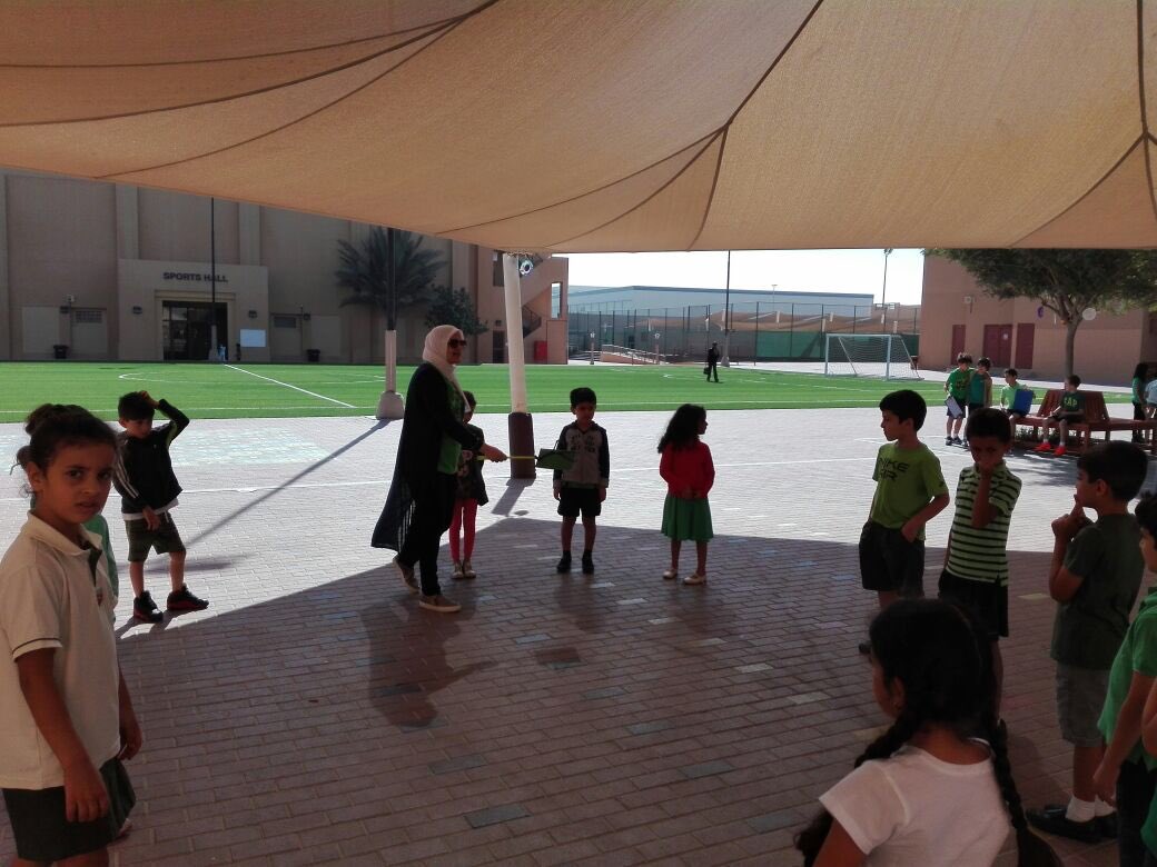 abeer17343246's tweet photo. #behappybeGCS #gcsgreenday Grade 1 Arabic A student is listening to the teacher and playing roles for a story entitled The Jungle Asking for Protection Outside the Class in Solidarity with Green Day https://t.co/dvsvrRGbGG
