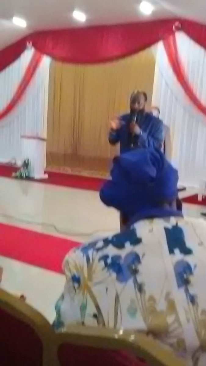 BrianElijah5's tweet photo. SHOCK AND STUN. 
A WONDER 
PPNAt the ongoing Meeting in Maputo, Mozambique. 
The Mightiest Prophet of the LORD YAHWEH doubled. 
The one behind him is shorter, arms straight. The one infront is visible and holding a microphone and is taller. 
#Thetwowitness https://t.co/5QpDwJJKBg
