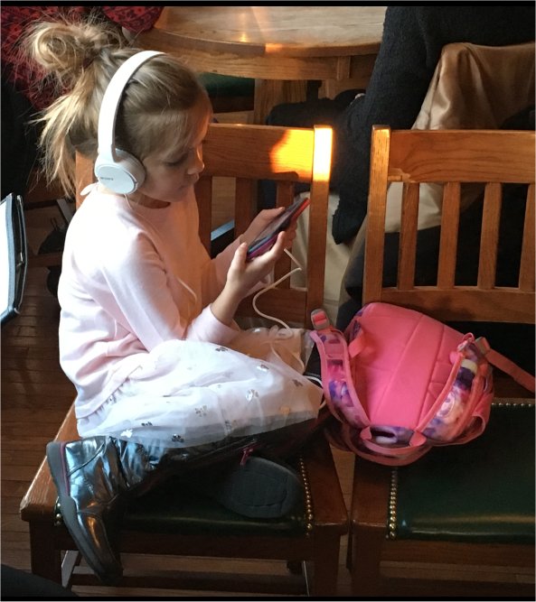 chukster70's tweet photo. Signs of the Times:  My 4 year old grand-niece, Ella.  She cant read yet but she can work an iPhone! https://t.co/k3gRAgCsgf