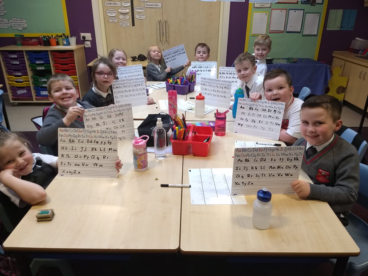 WhinhillP2's tweet image. P2s have been working hard on their  handwriting. We have been concentrating on the size and formation of our letters. Look how well we have done!  #handwriting, #neatwork
