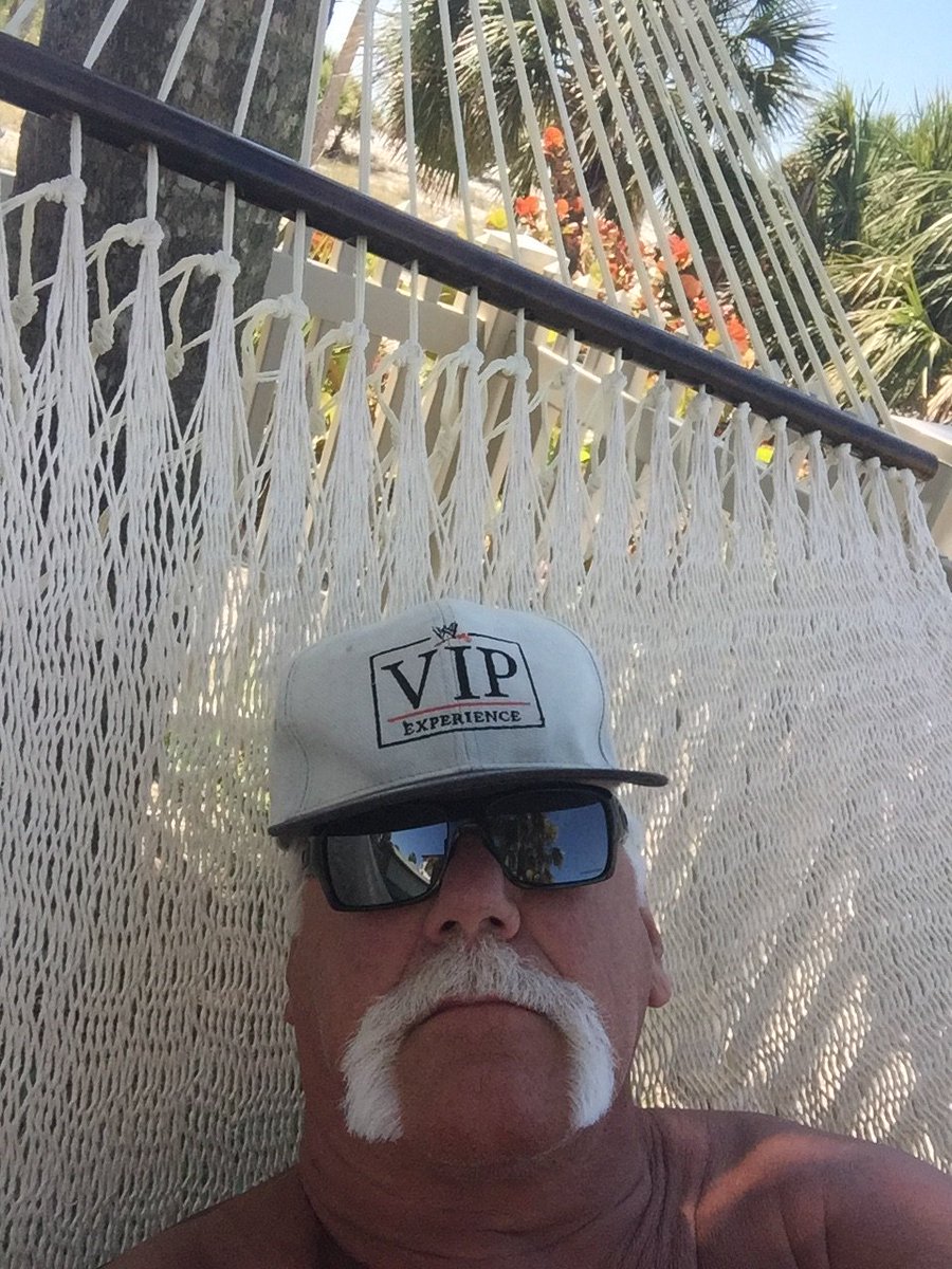 HulkHogan's tweet photo. Taking my “Leg Day” nap on the beach and dreaming about WM18 when the WWE Universe was “Runnin Wild��� with HULKAMANIA BROTHER.   HH https://t.co/iewW3YAiWN