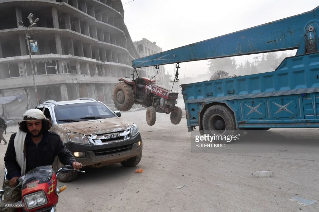 Halo_Mala's tweet photo. #BreakSilenceOnAfrin 

The Hitler didn't do somethings but Ardogan has completed Hitler's all agendas.
#Stolenchicken 
#Bombardinggraves 
@EmmanuelMacron https://t.co/O1D3wNA3bV
