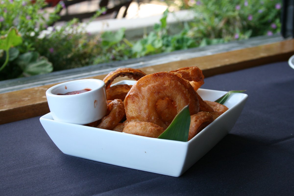 When you're feeling a hearty snack or share plate to pair with some afternoon cocktails-- our Onion Rings, from our In-Between menu.