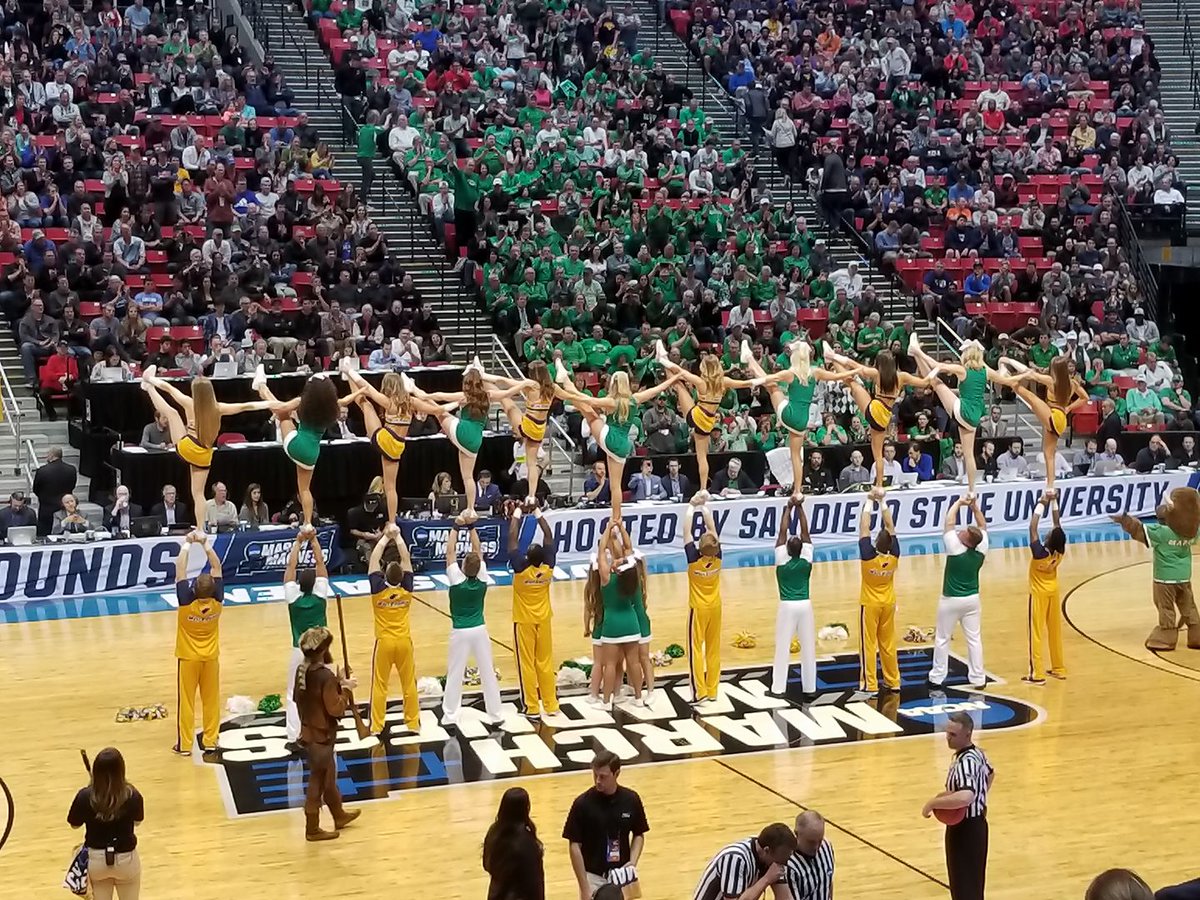 BSchuermanWX's tweet photo. Check this out! This is just awesome and what a way to represent #WestVirginia! @WestVirginiaU &amp; @marshallu Cheerleaders intermixed with each other at the #MarchMadness Game!! https://t.co/Mjde0X4Vpu