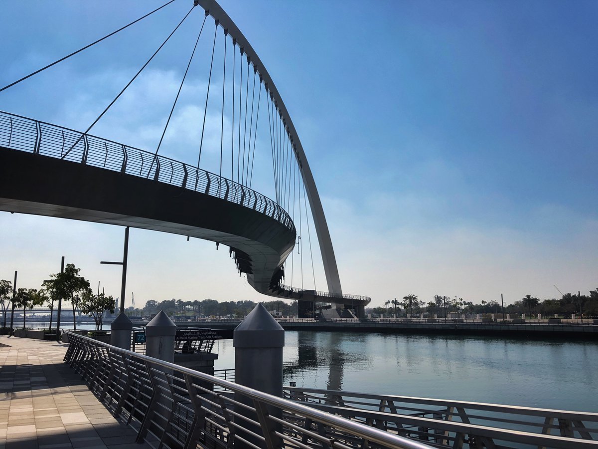 OfficialHiDubai's tweet photo. Come for a walk, come for the lovely bridges or just come to enjoy the waterfall! Dubai Canal is beautiful under the sun and mesmerizing with the lights at night. #Walif can help you get there and suggest interesting spots around too: https://t.co/XLzvUEwQYf https://t.co/fitnmA3xin