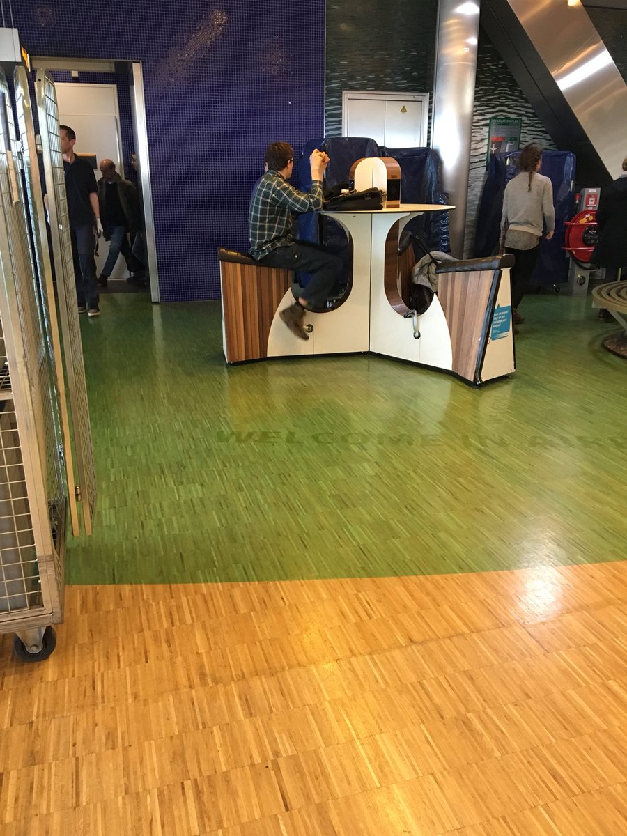 BeastmanWins's tweet photo. How genius, if only U.S. airports could be this #innovative. Yup, that’s a stationary bike with a table. #stayfitonthego #braincancerwhat #airportfun https://t.co/HpluwAq05s