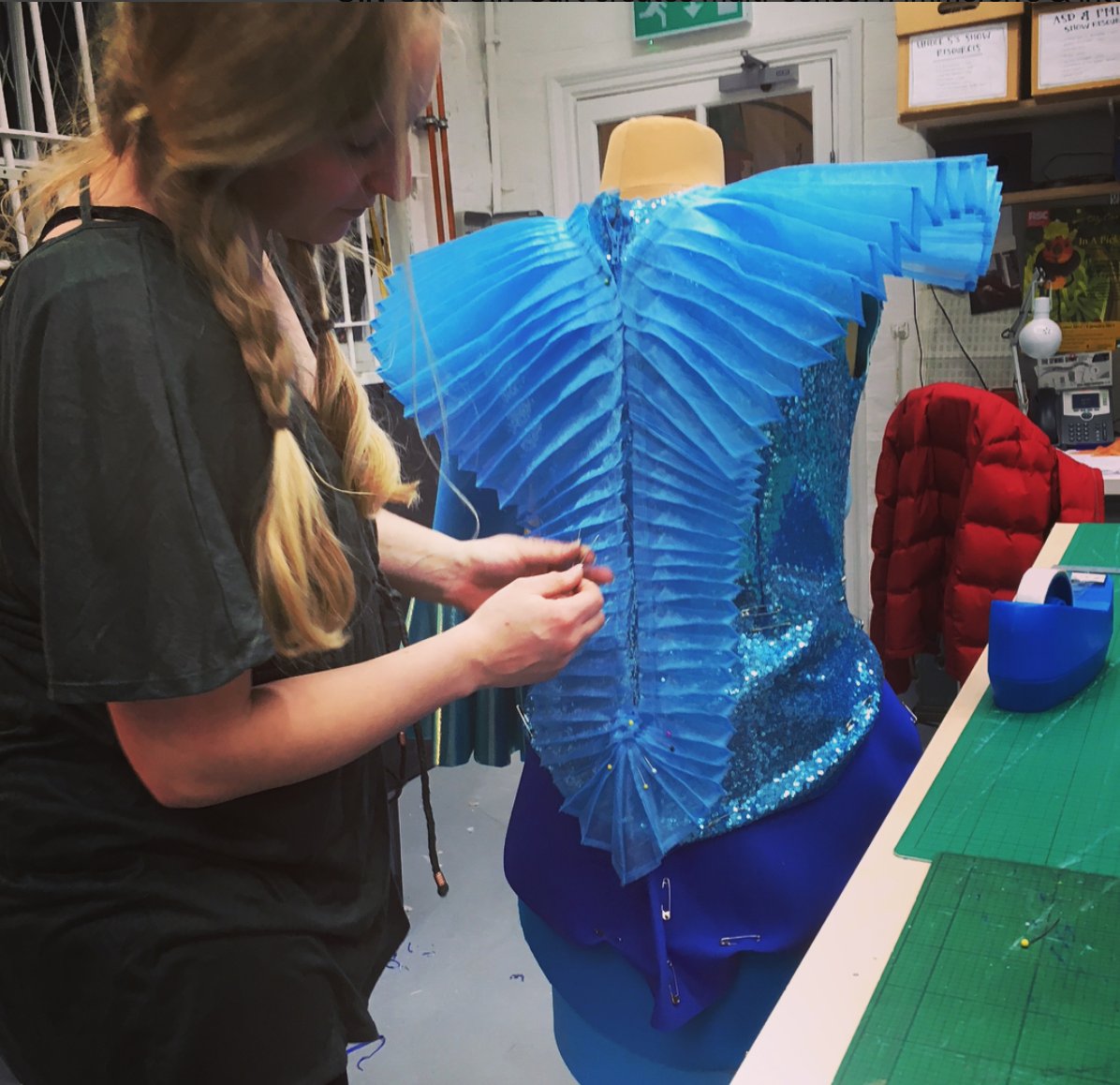 Sewing Mermaid's costume, which has pleated fins and lots of sparkles