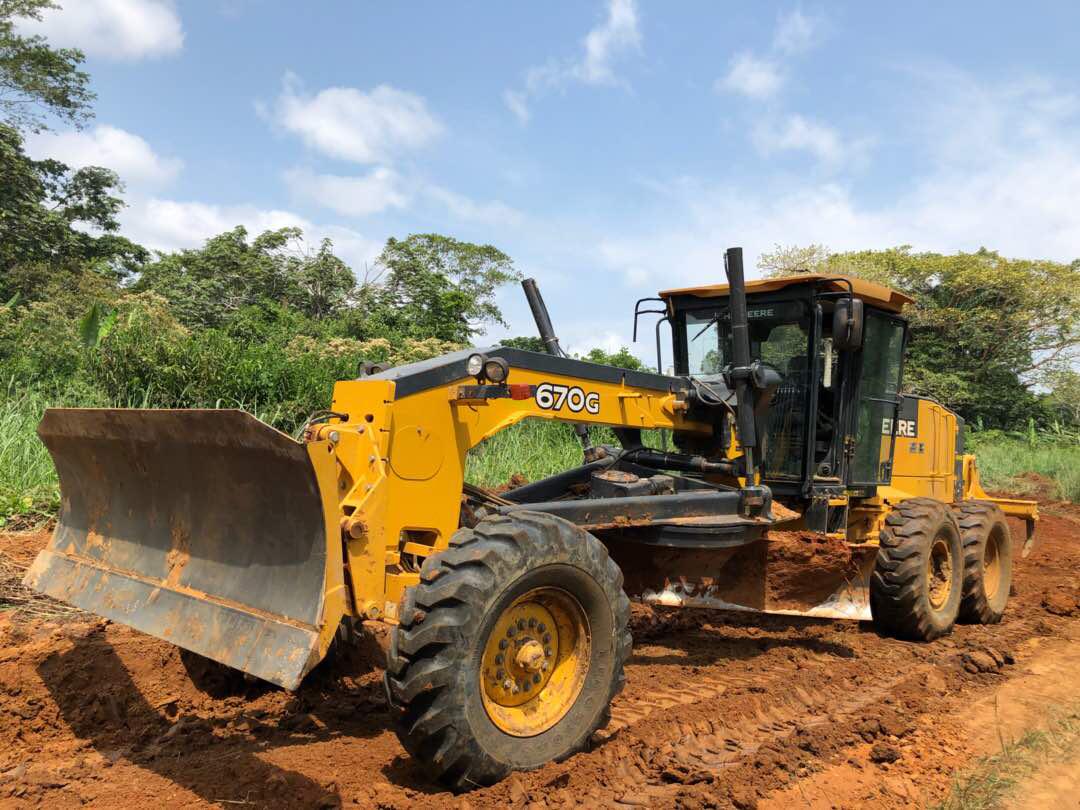 DEM_Group's tweet photo. New .@JohnDeere Grader 670G already in action in a palm oil plantation near Kinsangani, DRC ! #DemGroup #DemDRC #JohnDeere https://t.co/FbF0jfDqOD