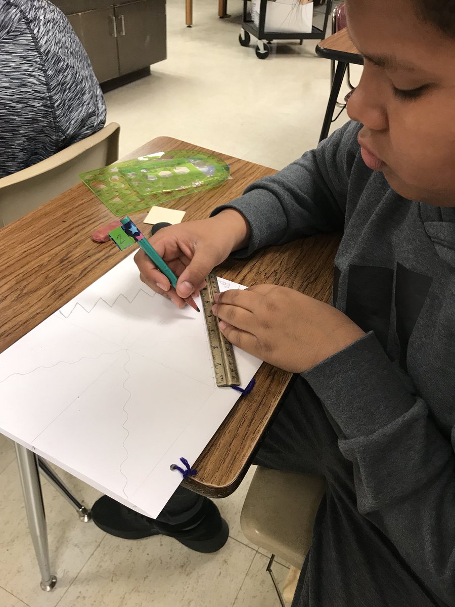 RuzickaART's tweet photo. Student trying to get his art exactly symmetrical. #focus #detail #measuring @RuzickaART @NJHS_Panther @npspanthers https://t.co/agCSjo8R83