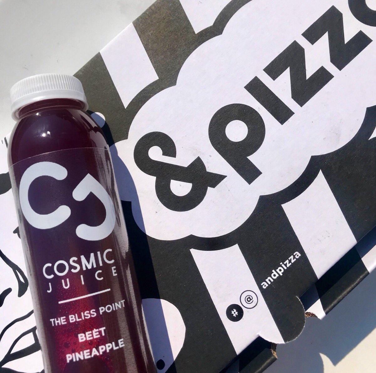 JuiceCosmic's tweet photo. We can def indulge in the “does pineapple belong on pizza” debate. Thoughts? ✨🍍 This Cosmic pairing is a hit for sure. https://t.co/zpdpOe315Q