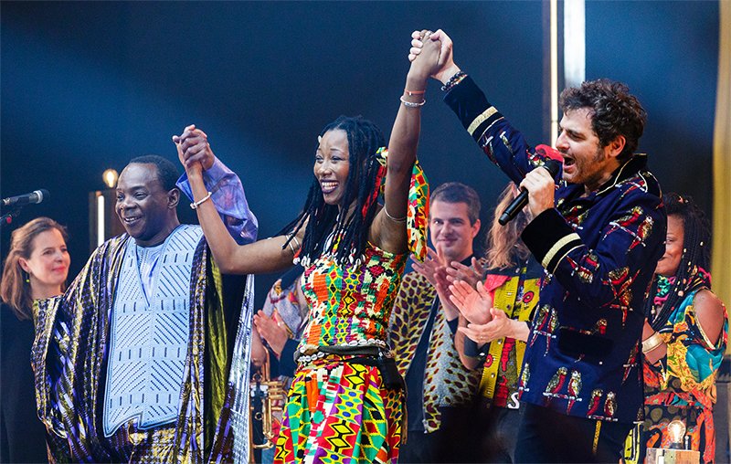 Trinity - <a href="/ToumaniDiabate/">Toumani Diabate</a> and <a href="/M_Chedid/">-M- Matthieu Chedid</a> present <a href="/FatouDiawara/">Fatoumata Diawara</a> to the audience at the end of the final gig of the #Lamomali tour, <a href="/AccorH_Arena/">AccorH_Arena</a> in #Paris (Dec 2017).