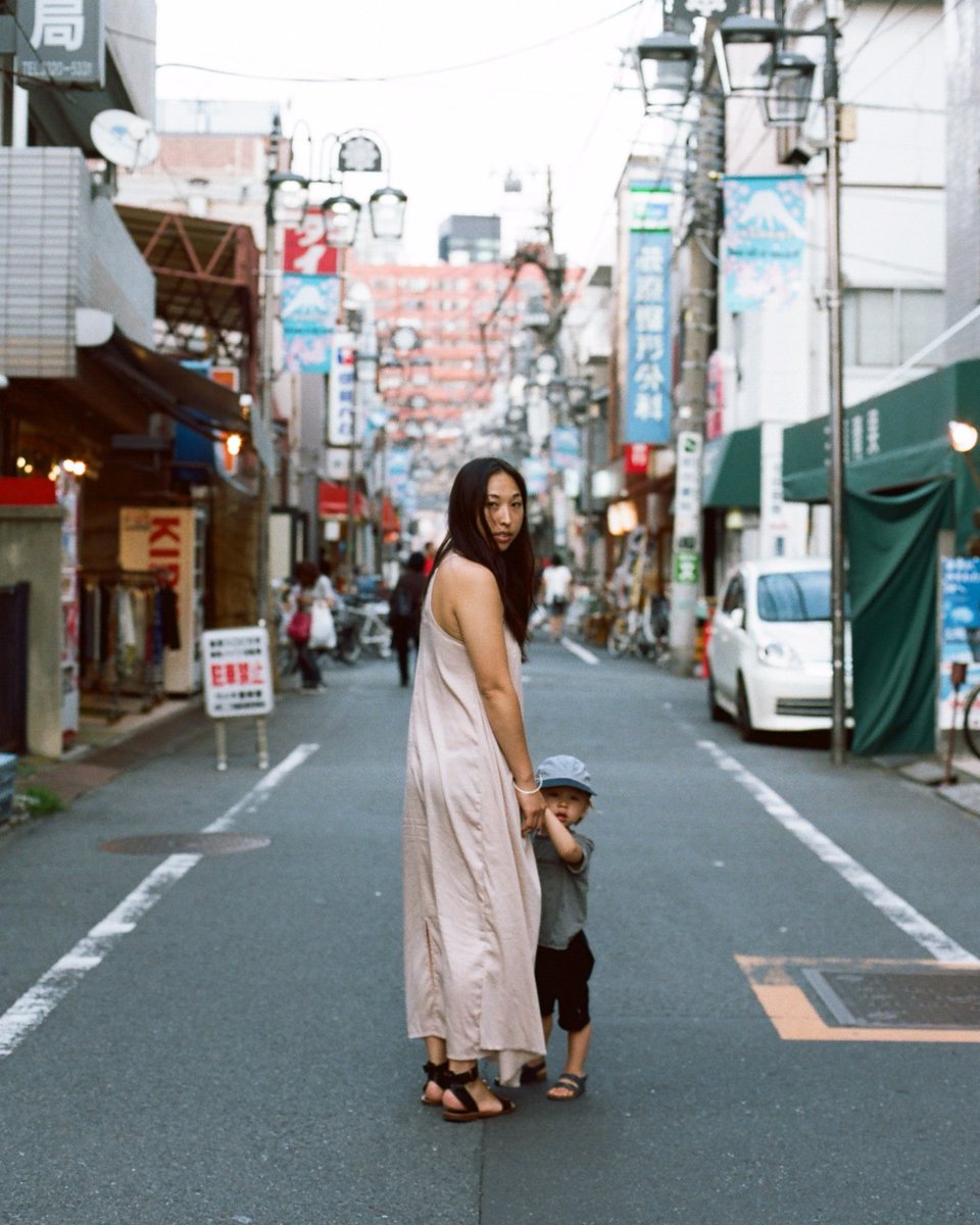 Taken nearly two years ago wandering the streets of Tokyo with these two. <a href="/madebysohn/">Joy S. Fitzgerald</a> #augusttoaugust #kodakfilm