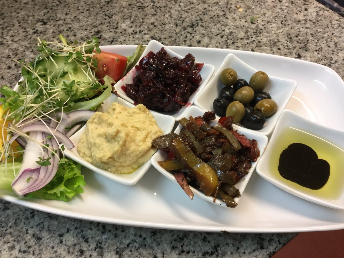 Who says that Vegans don’t have a variety of food: Look at our Vegan dipping plate..........served with locally made bread