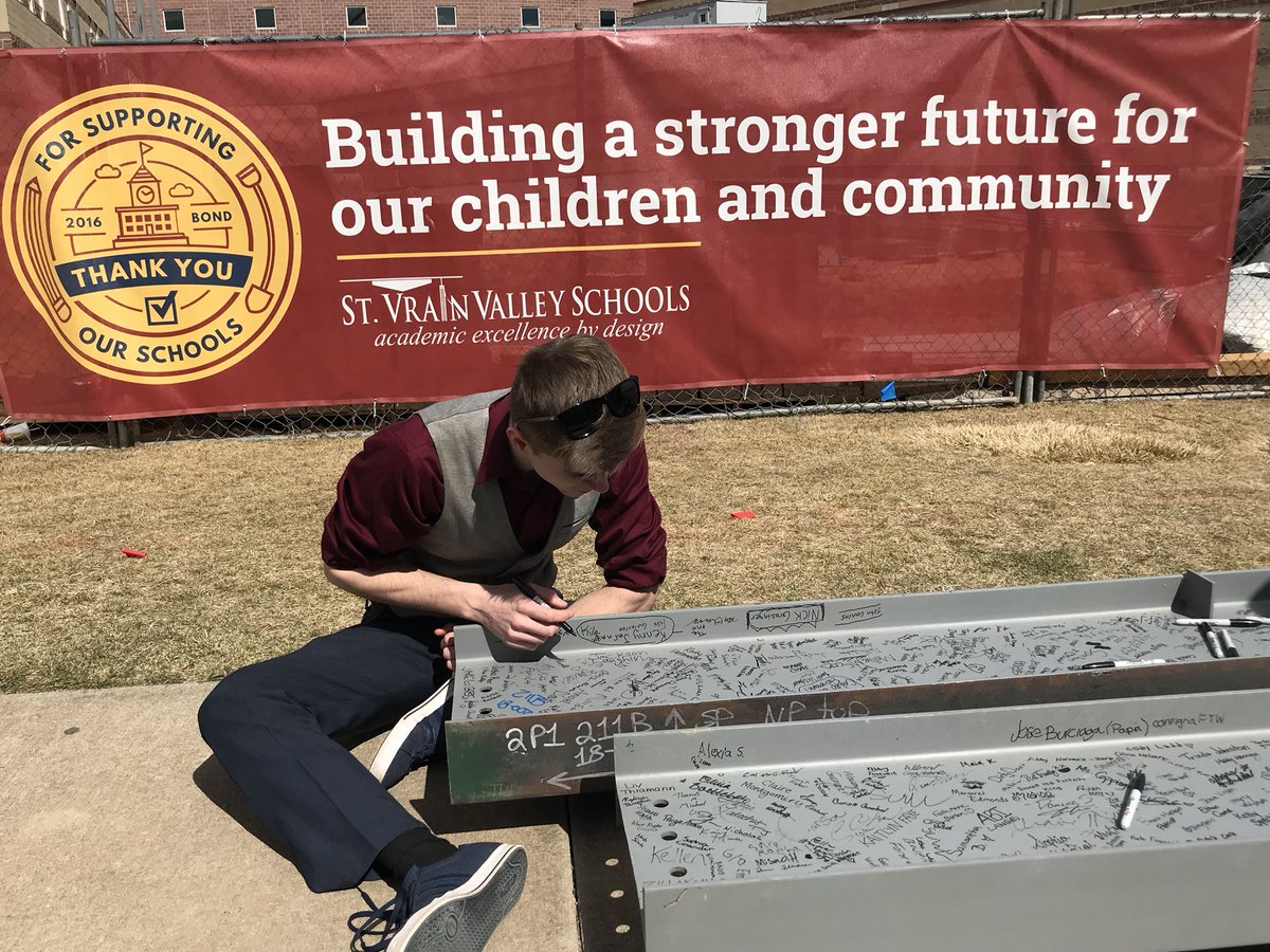 SilverCreekLA's tweet photo. Austin checking out at all the signatures on the beam- part of his @sclacapstone project!  @SCHSExpansion #svvsd https://t.co/cD4qjNg8P9