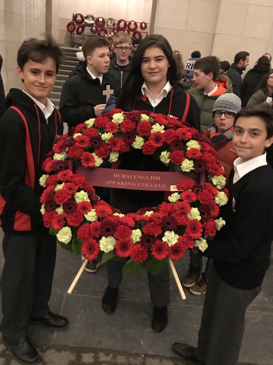 DESChistory's tweet photo. Albert, Danielle and Will representing everyone @descdubai at the Last Post this evening. #WeWillRememberThem https://t.co/OminvYlor4