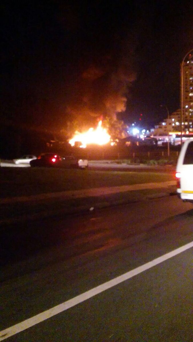 DheranGhela's tweet photo. Woodburn Garage, Midlands Caravan in Pietermaritzburg on fire. Avoid Durban Road. @TrafficSA https://t.co/uRfeRcG7Ps