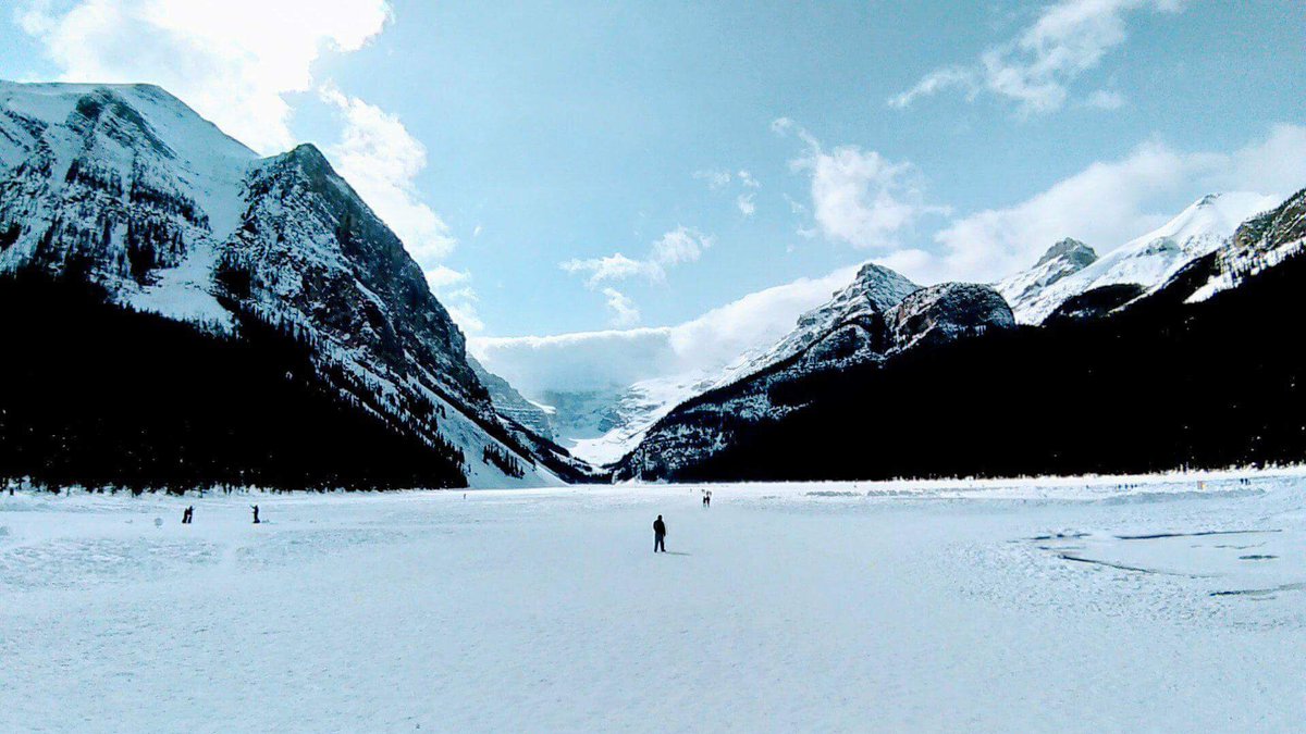 Banff_ski's tweet photo. Nothing will make you feel small like the awe inspiring mountains around Lake Louise 🏔 It’s still frozen over if you fancied the walk across yourself #canadianrockies #lakelouise https://t.co/qUOFw0xGhP
