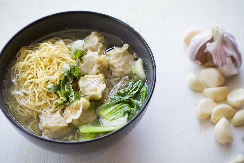 It's wonton Wednesday. Celebrate with our chicken wontons soup. It' float in a rich broth with curly egg noodles seasoned with fried garlic.