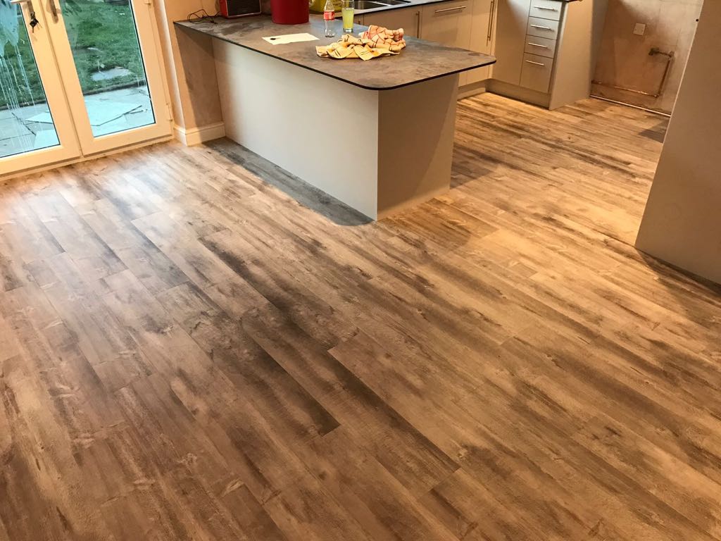 AndrewSMcHale's tweet photo. Recently installed ID55 Pallet Pine Brown in a residential kitchen and hallway @TarkettUK  #lvt #home #flooring #tarkett https://t.co/cOIu9PdxZk