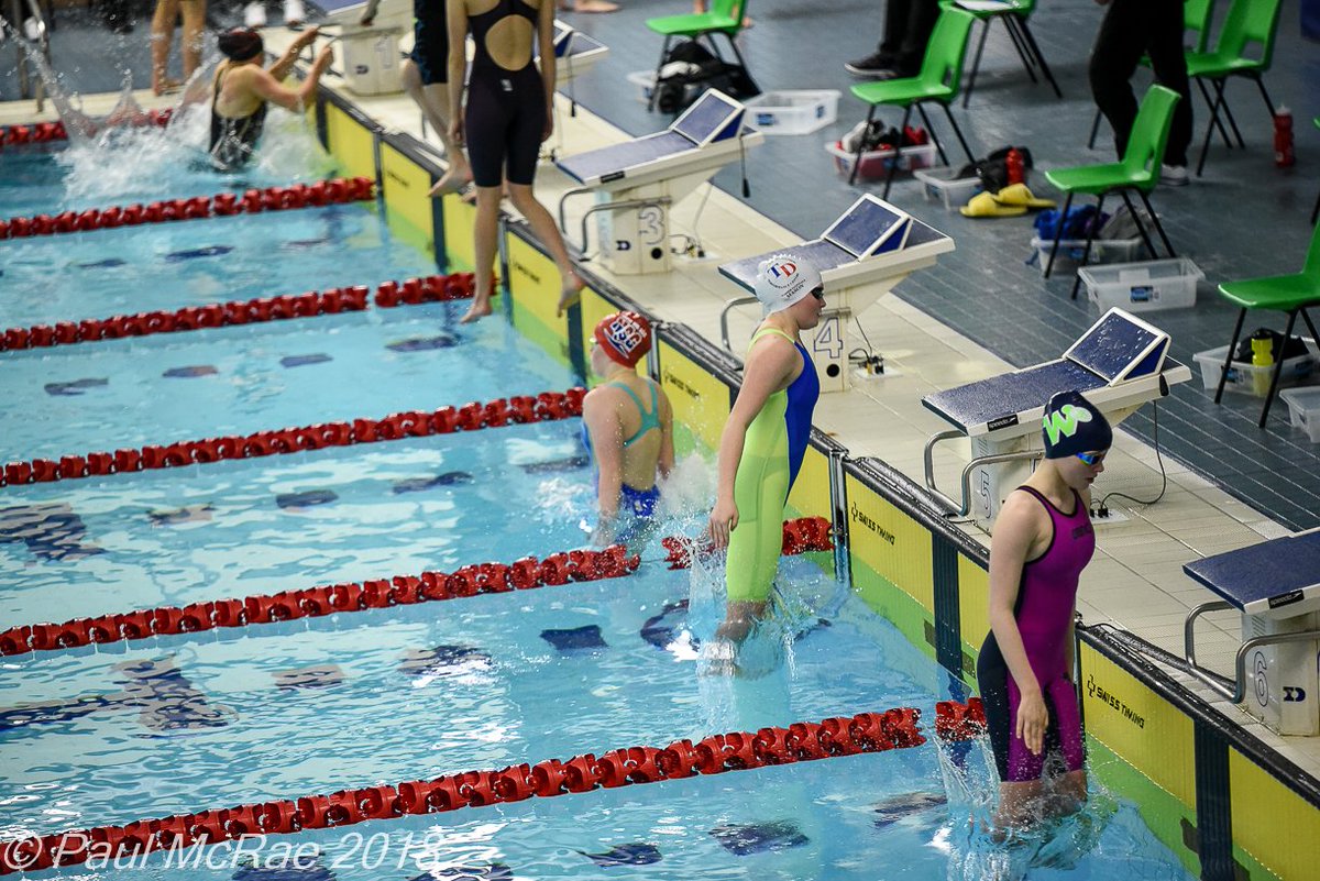 PaulMcRae5's tweet photo. @mcrae_lynne @TorfaenDolphins @SwimWales #SWLC18 Mair & Teoni..... Teoni displaying her special ability of walking on water https://t.co/aNrl6j25Ek
