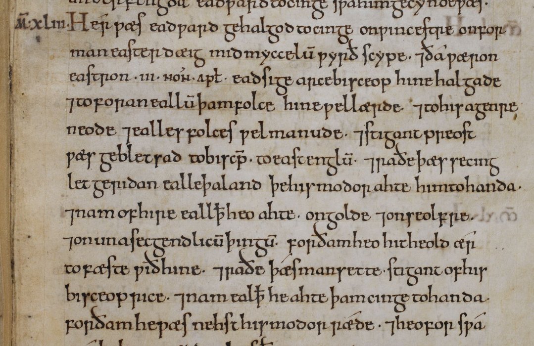 Text written in English vernacular minuscule, starting with the year in red and a red initial H. Cotton MS Tiberius B I, f. 157r.