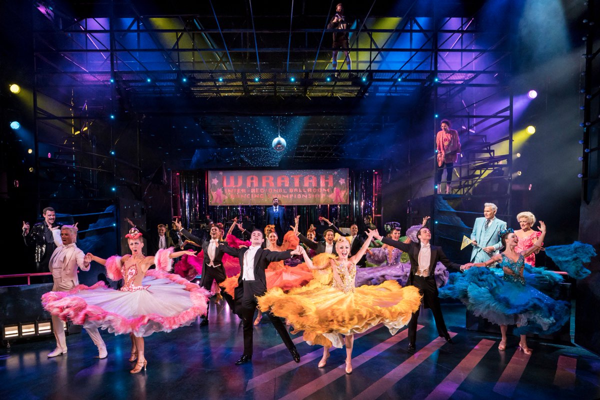 strictlystage's tweet photo. Here is your first look at #StrictlyBallroom The Musical, starring @jonnylabey, @ZiziStrallen and @willyoung. Directed and choreographed by @DrewMcOnie, it is now playing at London's Piccadilly Theatre. More stunning photos to be revealed soon...
https://t.co/7HxhruES9e https://t.co/nZgsZjJgJD