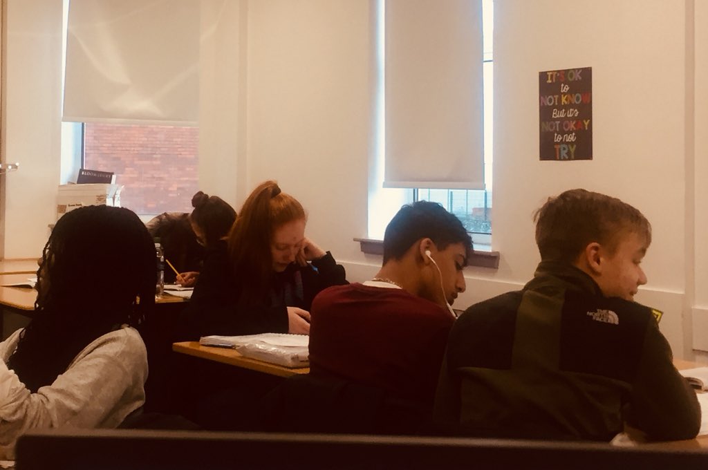 Happy faces. Hard at work. One of these things is true.